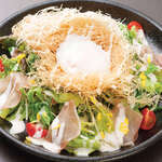 Warm egg nest-style Caesar salad