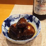 Genkai Zushi - お通し  カンパチのアラ炊き