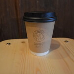 ディグモグコーヒー - ウェルモがデザインされた紙コップ