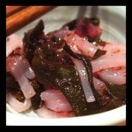 海味 はちきょう - お通しのイカ。梅しそ風味？