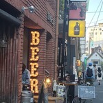 クラフトビール量り売りTAP&GROWLER - プチガーデンの近くです(右端)