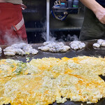 タマちゃん - たっぷりと牡蠣を焼いています。