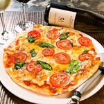 Margherita with fresh tomatoes and basil