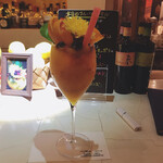 バー アウル - ドリンク写真:タンカンたっぷりのシーサーコリンズ