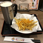 湯～とぴあ宝 オープンカフェ - 生ビール610円にスパイシーポテト450円。