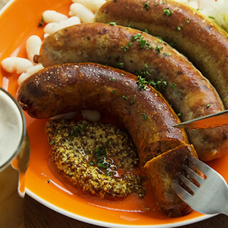 Enjoy homemade juicy sausages and seasonal vegetables