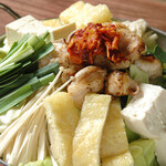 博多串 寅吉 - 炙りもつ鍋(3種のスープからお選び下さい)