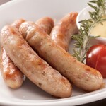 Boiled coarsely ground sausage served with German-style mustard flavored with rosemary