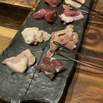 Tetsunabe Izakaya Kurohanabi - 黒花火のもつ焼き8種盛り合わせ、1,080円(税別)