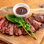 Grilled skirt steak with chimichurri sauce