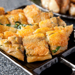 もつ無双 ゆまる - 大人気のチーズチヂミ