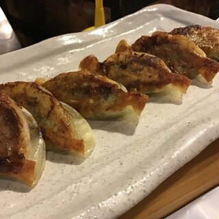 The one and only exquisite fried Gyoza / Dumpling eaten with soba soup.