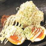 Potato salad with soft-boiled eggs and minced chicken