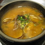 おんどる - 蓋をとりました。ピリ辛でアサリの旨みが良い！ご飯入れても美味しそう。