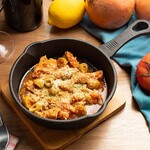 グリーンオリーブとトリッパのトマト煮込み