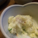 Izakaya Biggu - お通しのポテサラ（食べかけ）