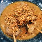 串焼き 巴 - もつ串煮込み  鬼七味