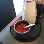 自家製麺 うどんAS - 吉田のうどんと言えば、すりだね＝辛いやつ。生唐辛子粉っぽくて、しっかりと辛い。