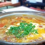 大衆割烹 のぼる - 牛もつと豆腐の辛みそ煮 650円