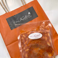 シェ ケンタロウ - 神奈川県の上質銘柄豚 やまゆりポークと白インゲン豆のトマト煮（テイクアウト）