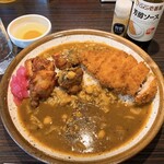 CoCo壱番屋 - ‪スパイシーマサラカレーに手仕込みとんかつと生卵トッピング‬