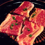 一力 - 半額日で佐賀牛骨付きカルビ1人前の画像700円→350円