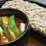 Soba noodles with braised black pork and seasonal vegetables in miso sauce