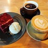 Coffee Affairs Roasters - 料理写真:アイス付きのレッドベルベットチーズケーキRM14.00、手前はAffairs Hazelnut Latte　RM13.00、奥はAmericano RM10.00