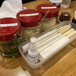 横浜家系ラーメン 一新家 - 【感染症対策】お箸は箸袋に入れて設置しております