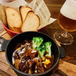 Beef stew simmered in local beer