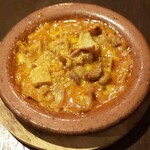 パラッツォ サン グスト - ブラウンスイス牛モツのトマト煮込み
