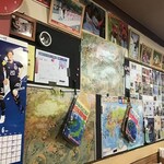 たんぽぽ - 外国から来られたお客さん達は、店内の世界地図に自分が住んでいる箇所へマークシールを貼って帰られます。