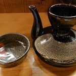 おてちきや - カラカラ
      前割りしてお燗した芋焼酎が入ってる