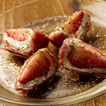 Strawberry and cheese wrapped in Prosciutto