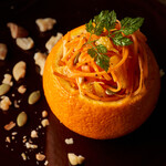 Whole orange carrot rappe with the aroma of smoked nuts