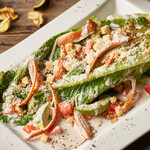 Caesar salad with smoked chicken and avocado