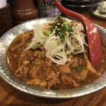 串焼キ カメチヨ・シャルボン - ピリ辛鶏皮煮込み 300円