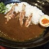 阿倍野肉食大衆酒場　肉ばんざい - 野菜がとろけた10種のスパイスの鶏出汁カレーに鶏肉3つと味たまが乗ってます