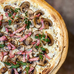 Mushroom and bacon garlic mustard pizza