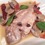 Aqua pazza with a whole fish in season