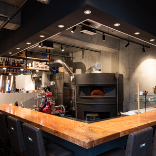 Enjoy pizza in a stylish space for adults in the basement.