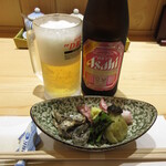 旬魚 たつみ - 瓶ビール中瓶(600円)とお通し(300円)