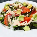 Salmon and cheese salad plate with rye bread