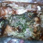 日の出 - テイクアウトの肉玉お好み焼き脂キャベツ大盛りです