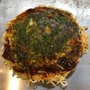 Okonomi Suri Emu - お好み焼きの、そば肉玉子
                (麺1玉、しそトッピング)。