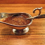 ステーキハウス 武蔵野 - ステーキソース（ガーリックオニオンソース）