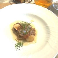 La Brianza - ポーク顔のお肉やモツなど煮込みウズラ豆入り、コラーゲンたっぷり！　トロトロに煮込まれて、濃厚なのに南蛮漬けや酢豚のようなほのかな酸味ある味付けすっきりおいしい。口溶けすごい