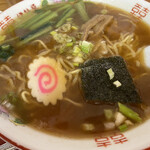 Iseya - スープはとても美味しい。青菜は浅漬けなのか少し酸味があります。