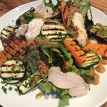 Grilled vegetables and steamed chicken salad with homemade carrot dressing