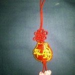 台湾家庭料理 福味香 - 頂いた縁起物のアクセサリーです片面が「平安」